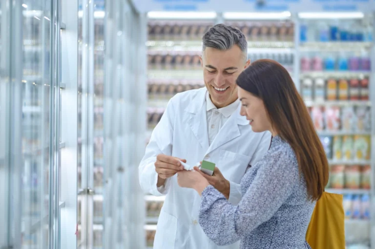A pharmacist checking medicine stock